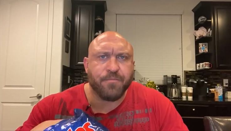 Bald Guy Eating Chips
