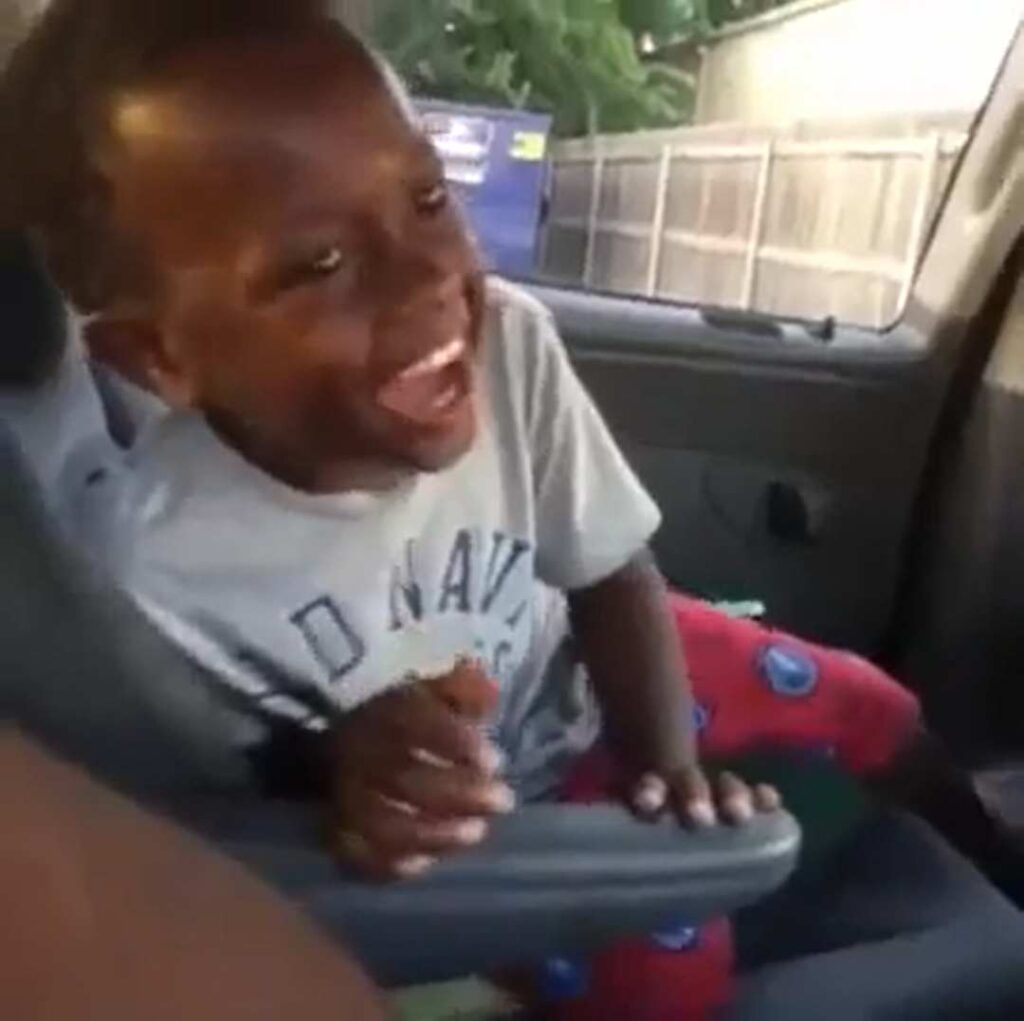 Kid Laughing In Car